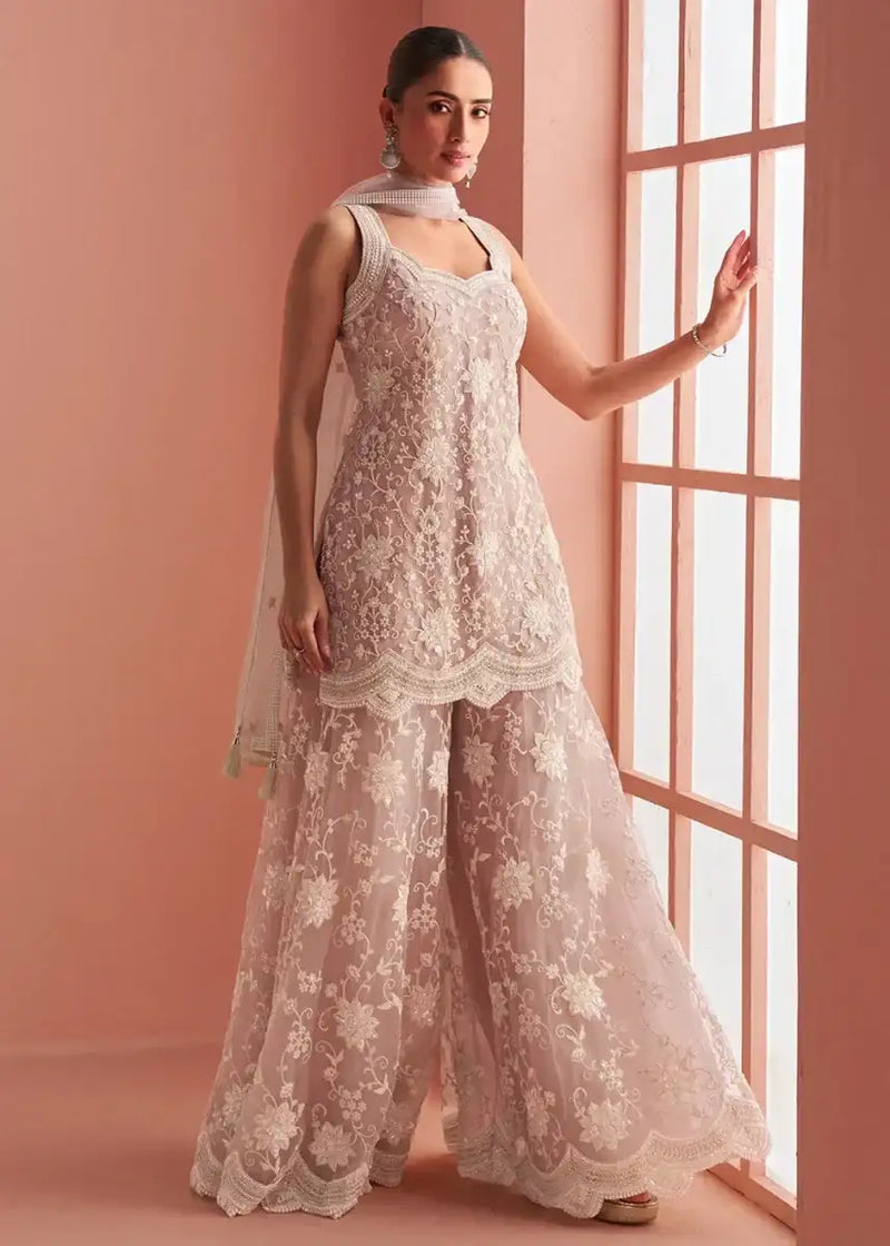 Dusty rose embroidered net palazzo suit with sleeveless top and wide-leg pants