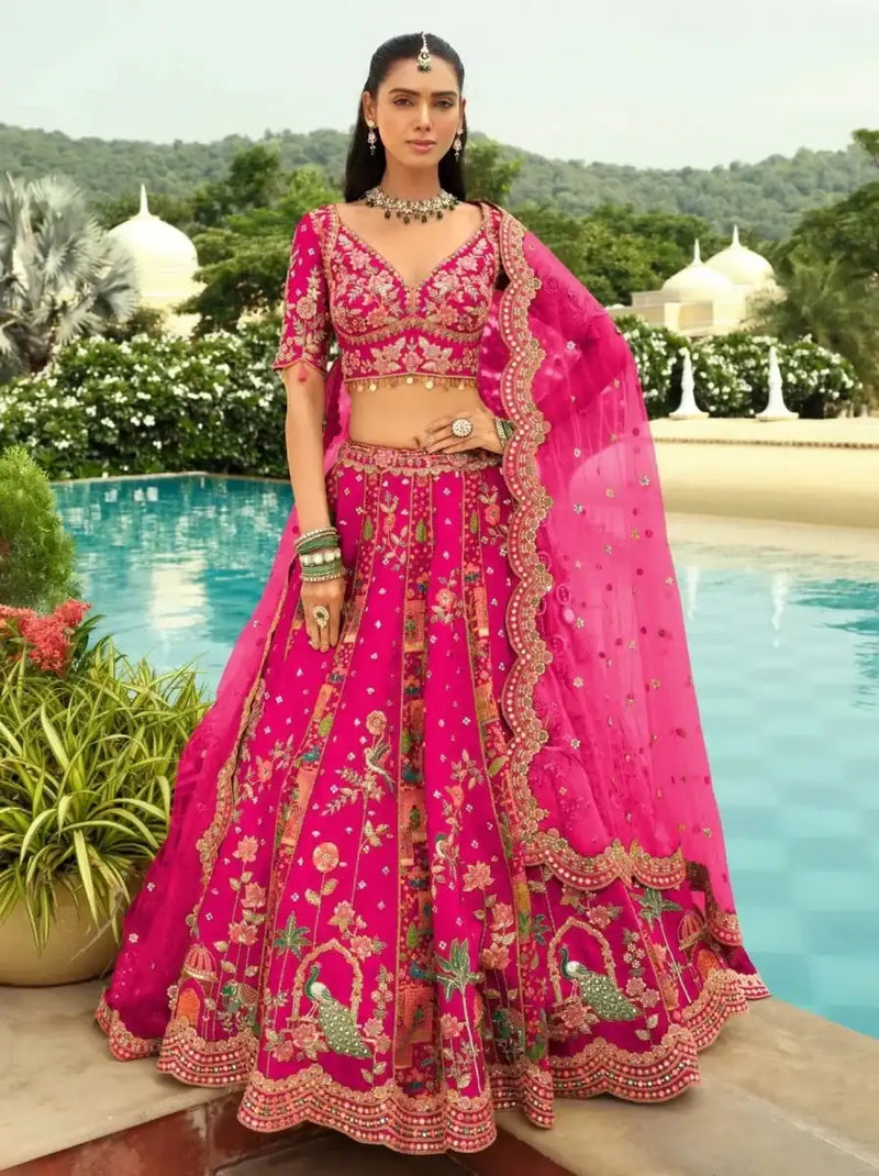 Pink floral mirror-work lehenga with dupatta, gold trim and scalloped hem