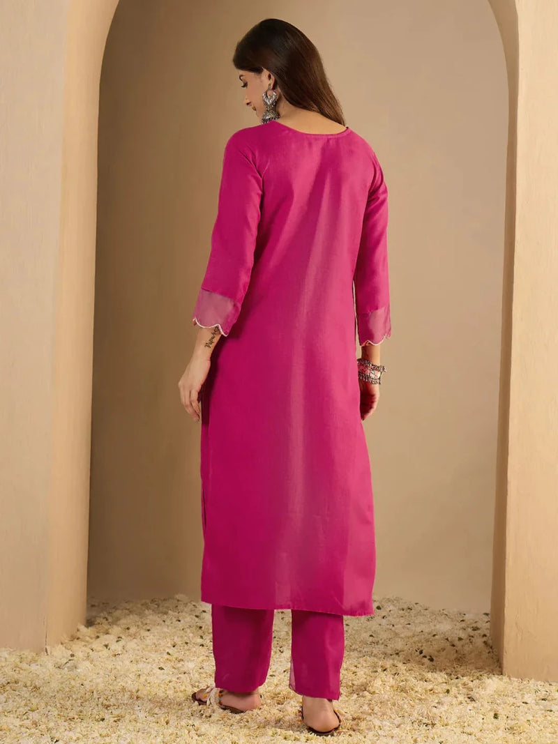 Magenta kurti and matching pants set, back view with scalloped hem trim