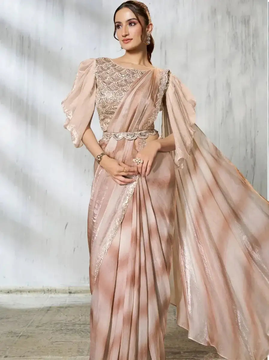 Rose gold metallic pleated skirt saree with balloon sleeves and embellished waist belt
