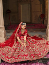 Red bridal lehenga skirt with ornate gold embroidery, full flare and draped dupatta