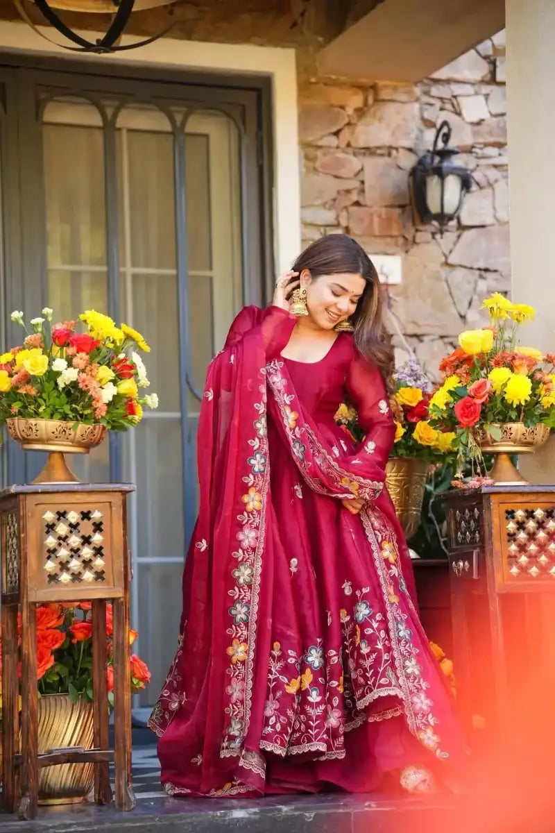 Maroon anarkali dress with floral sequin thread embroidery and decorative border, full length