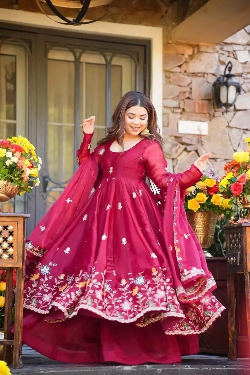 Maroon anarkali dress with floral embroidery hem and sequined detailing, flared skirt