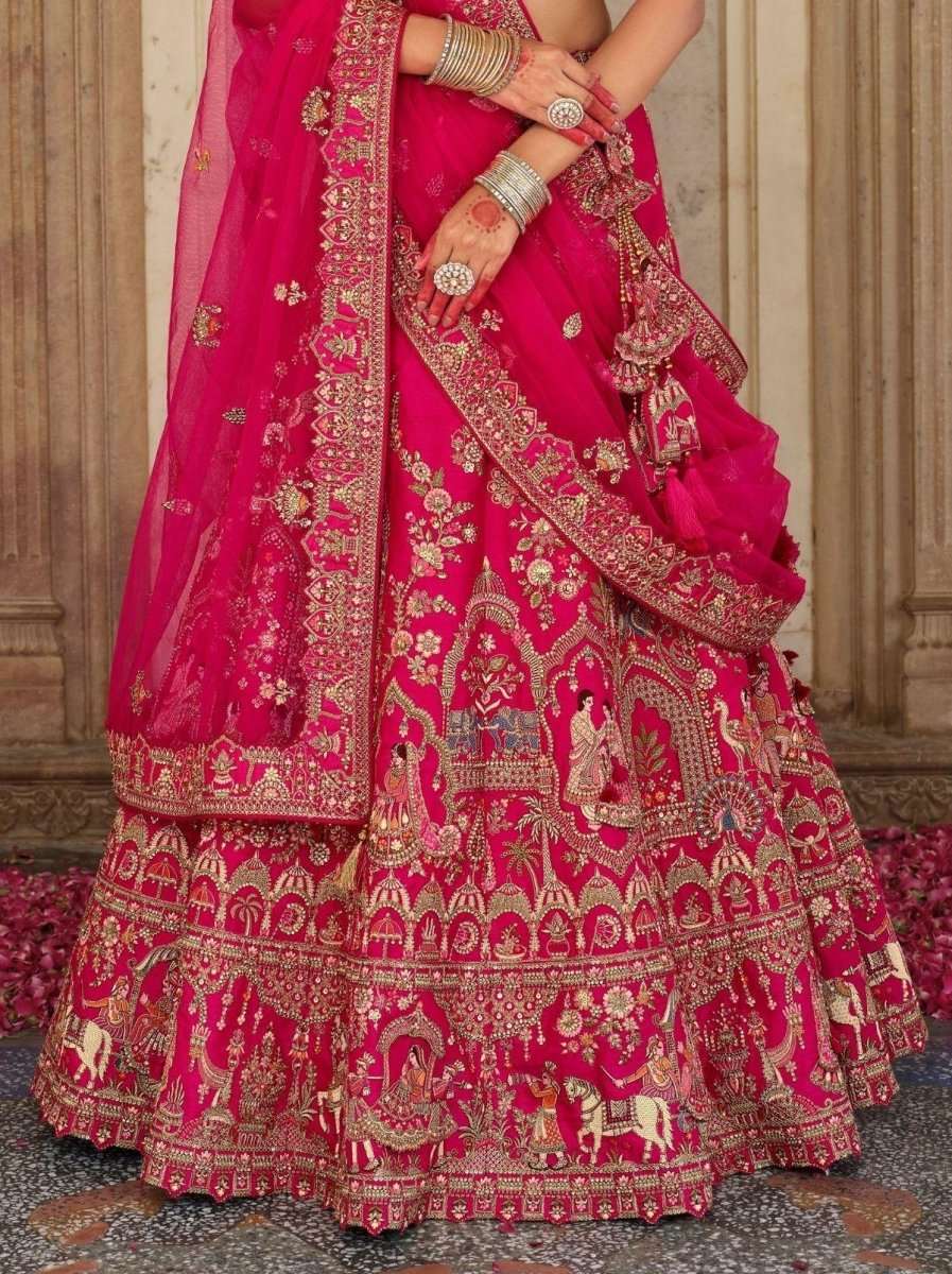 Bridal silk lehenga skirt in rani pink with gold zari and embroidered border