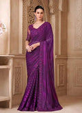 Royal violet satin silk saree with sheer back blouse, embellished border and drape
