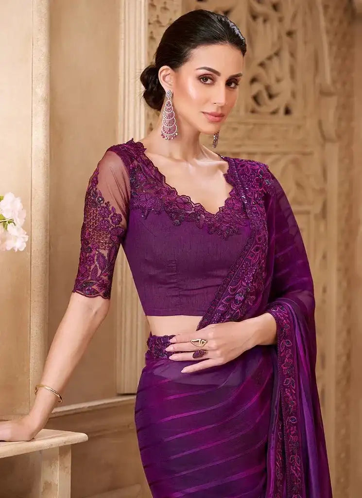 Royal violet satin saree with lace sleeves and V-neck fitted blouse