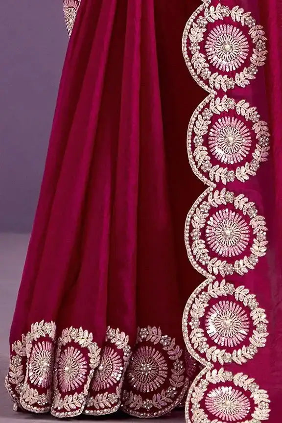 Ruby pink velvet saree skirt hem with circular embroidery and scalloped border