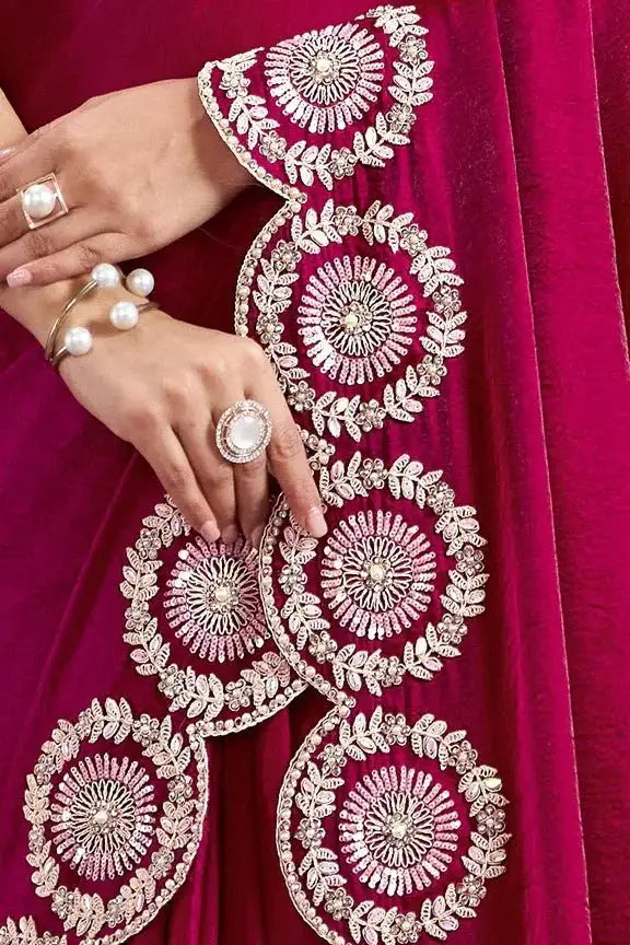 Ruby pink velvet saree with dense circular embroidery and scalloped edge on border