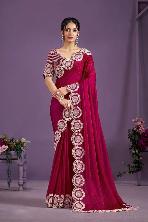 Ruby pink velvet saree with scalloped border and circular gold-toned embroidery