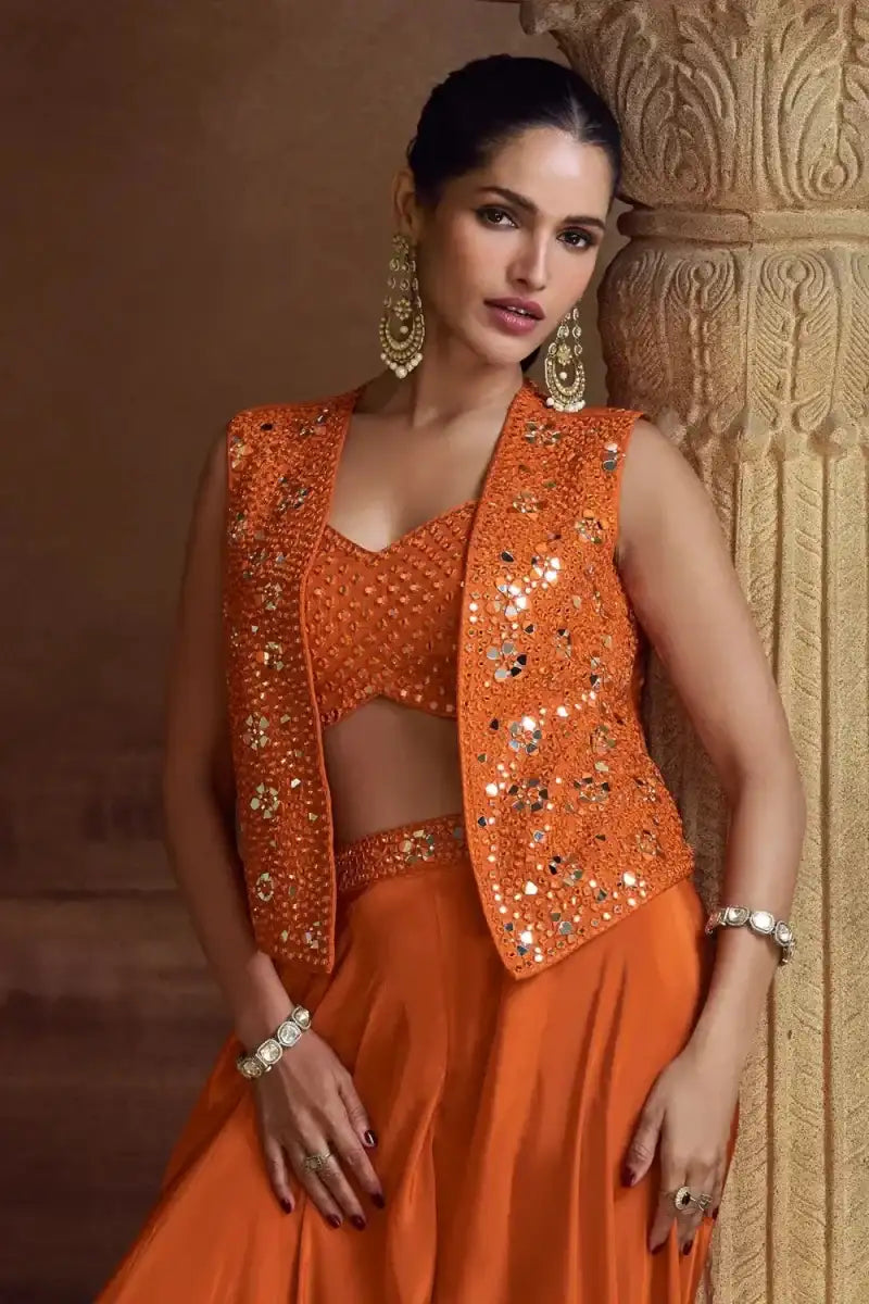 Rust orange mirror-work sleeveless jacket over matching dress, V neckline