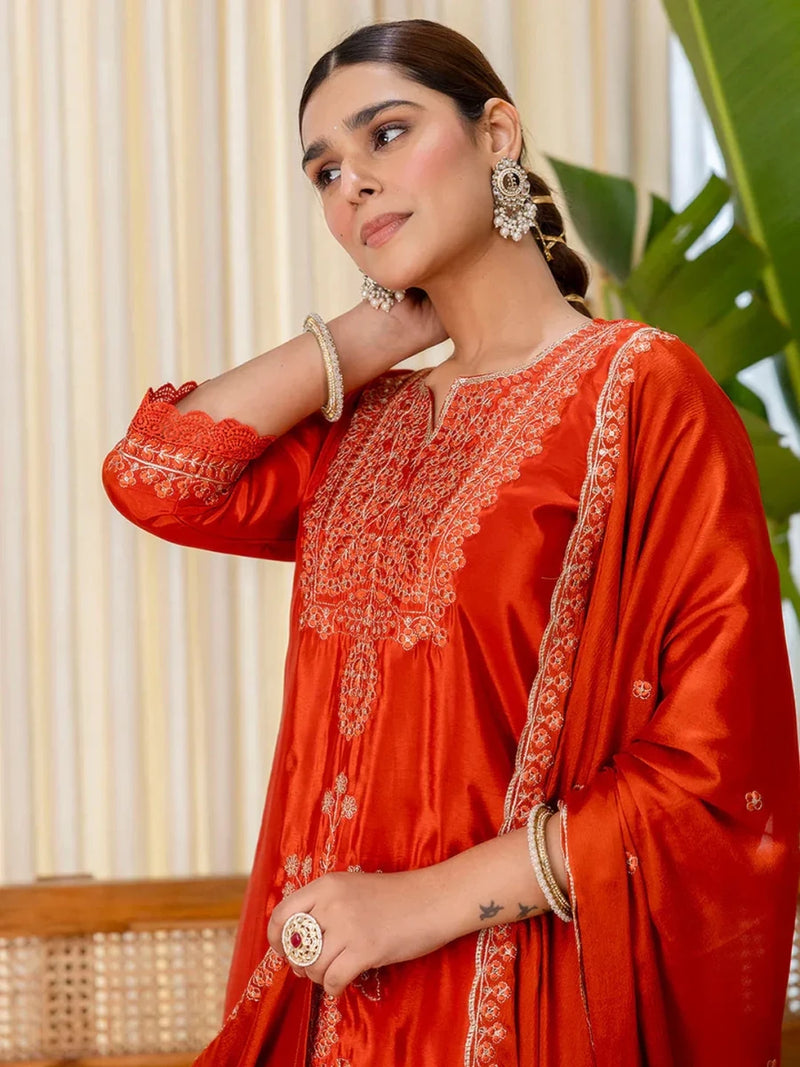 Rust red embroidered kurti suit set with detailed neckline and lace-edged sleeves