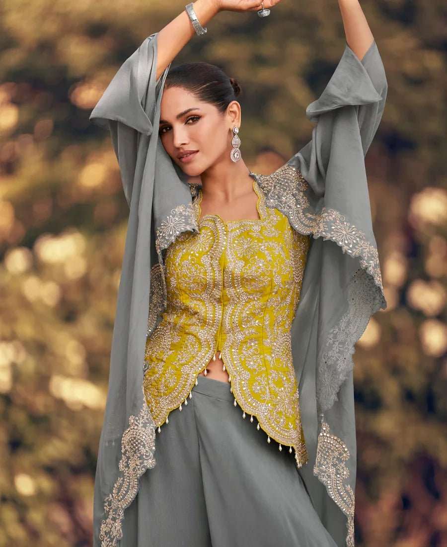 Mustard embroidered dress with slate grey organza cape and silver-toned border