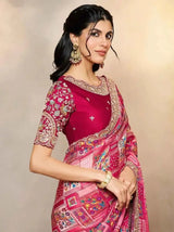 Magenta silk saree with embellished multicolor pallu and matching blouse sleeves