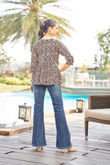 Flared rayon tunic with dark medallion print, V-neck, and three-quarter sleeves