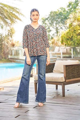Mandala print flared rayon tunic with dark V-neck and three-quarter sleeves