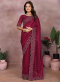 Maroon lycra saree with scalloped lace border and patterned pallu, full-length drape