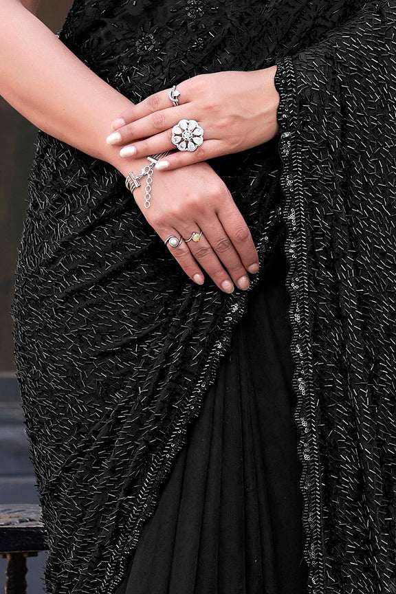 Black tulle saree with beaded bodice and layered skirt