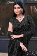 Black tulle saree with beadwork and floral applique, V-neck blouse drape