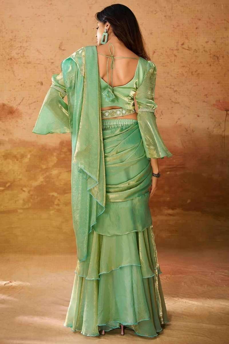 Mint green organza western saree with back tie bow and layered sleeve ruffles