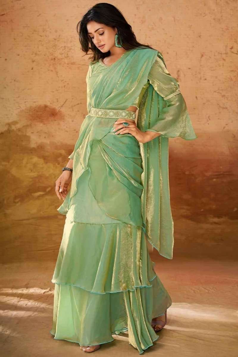 Mint green organza western saree with flowing dupatta and tiered ruffle skirt