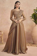 Mocha-brown drape saree with gold belt and ornate shoulder embellishment