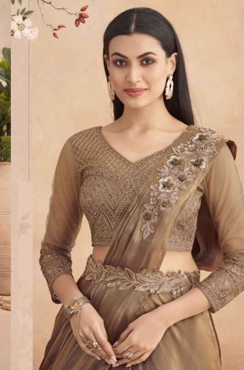 Mocha-brown saree blouse with gold belt and floral border on shoulder