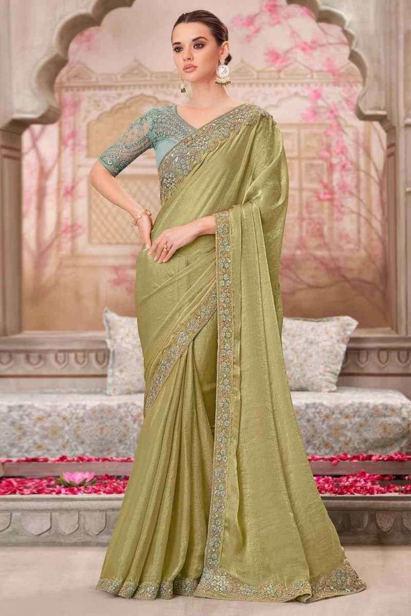 Olive-green satin silk saree with gold embroidered border and pallu, draped on model