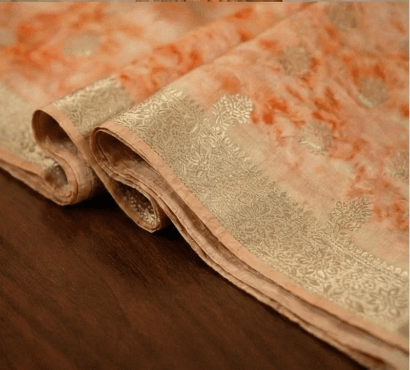 Peach shibori print Banarasi silk border detail with beige zari weave