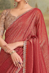 Red embroidered saree drape with cream scalloped border detail and lace-trim pallu