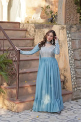 Sequined georgette gown, light blue with silver yoke, long sleeves, tiered skirt