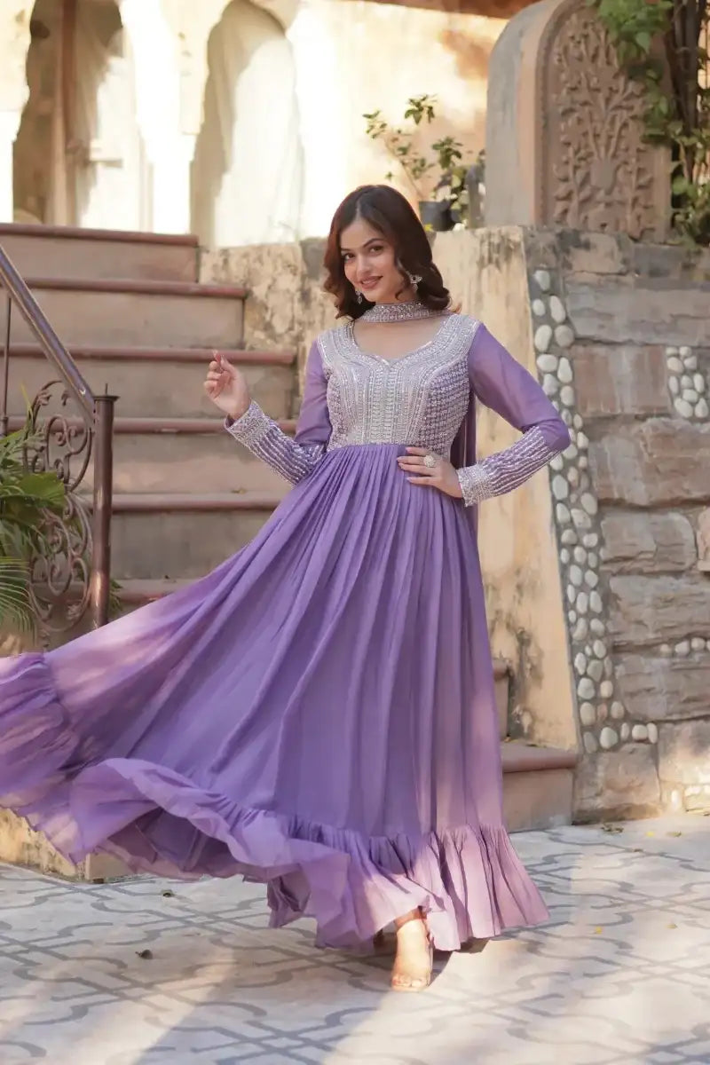 Purple sequined georgette gown, flared skirt and long sleeves