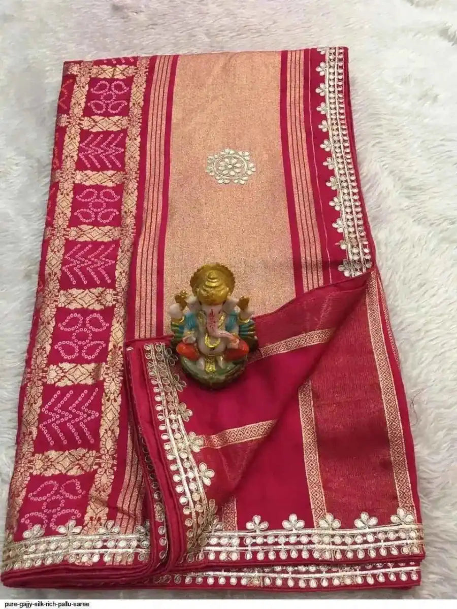 Beige and maroon silk saree with striped pallu and ornate gota patti border