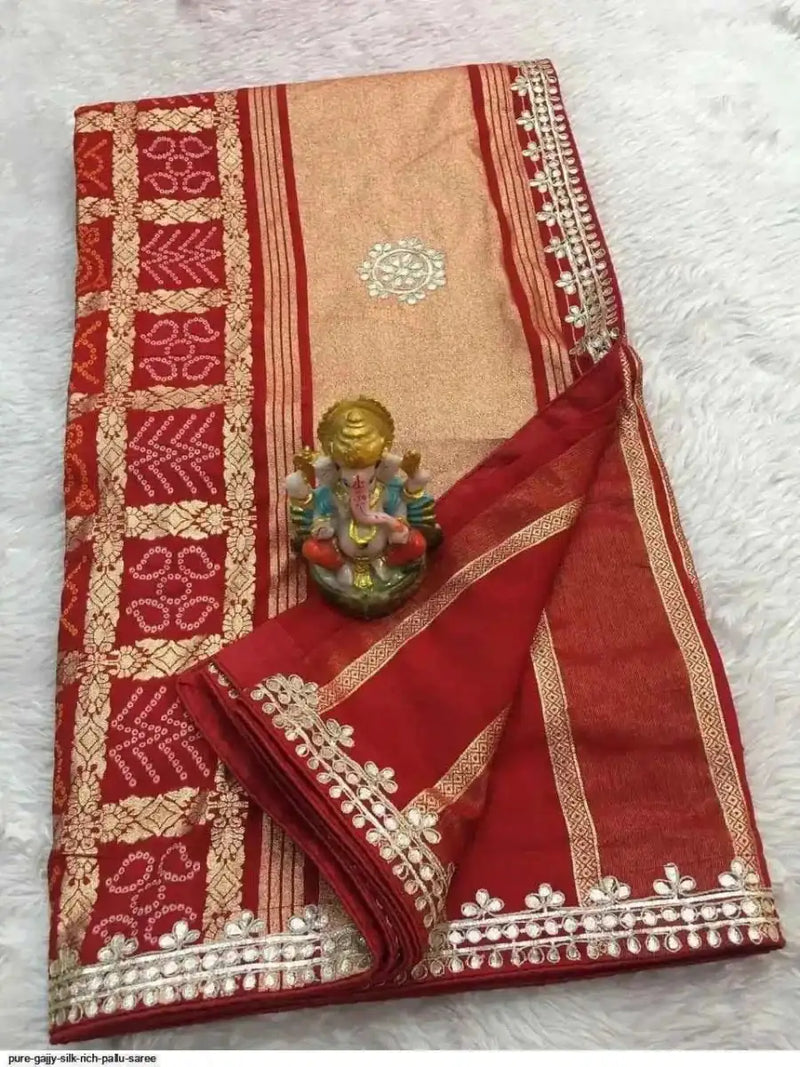 Beige and magenta silk saree with patterned border and embellished pallu