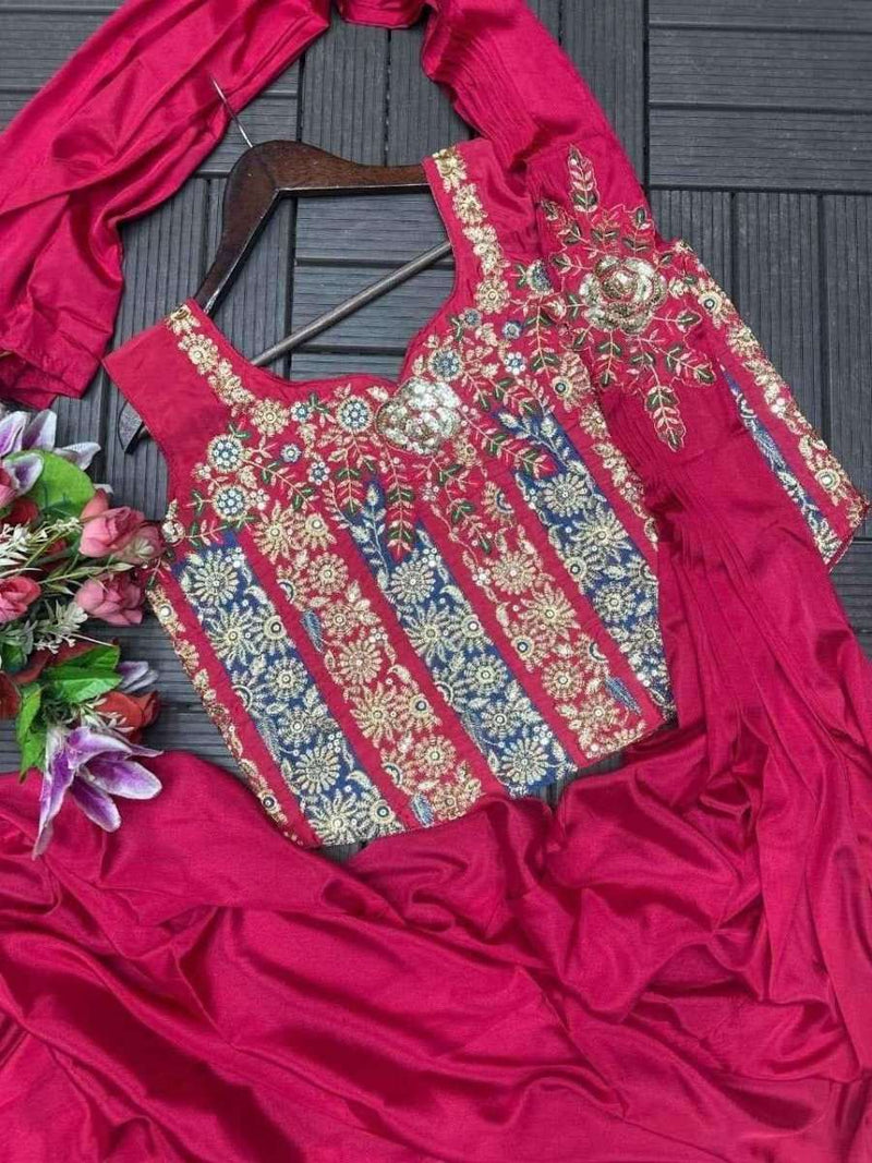 Magenta embroidered crepe dress with floral yoke detail and blue-red-gold panel motifs