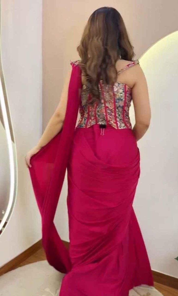 Pink crepe ready-to-wear saree with embroidered back yoke and draped skirt