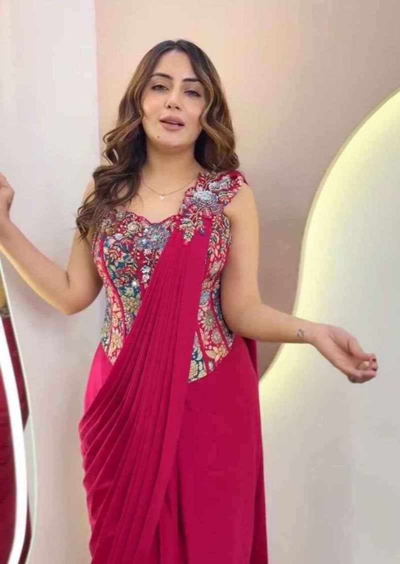 Pink crepe ready-to-wear saree with multicolor embroidered neckline and bodice