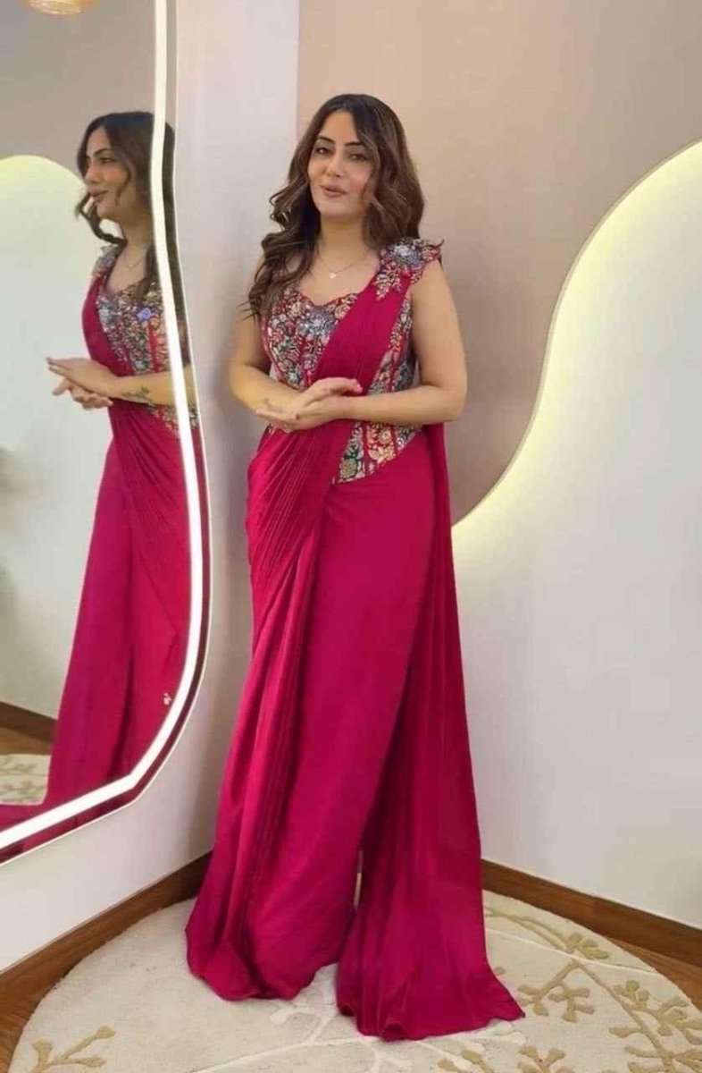 Pink crepe ready-to-wear saree with floral embroidered bodice and draped pallu