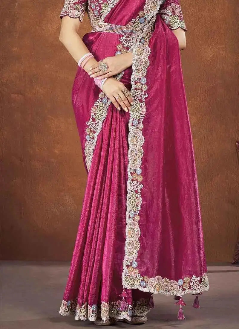 Rose pink silk saree long panel with ornate gold-cream border and hem trim