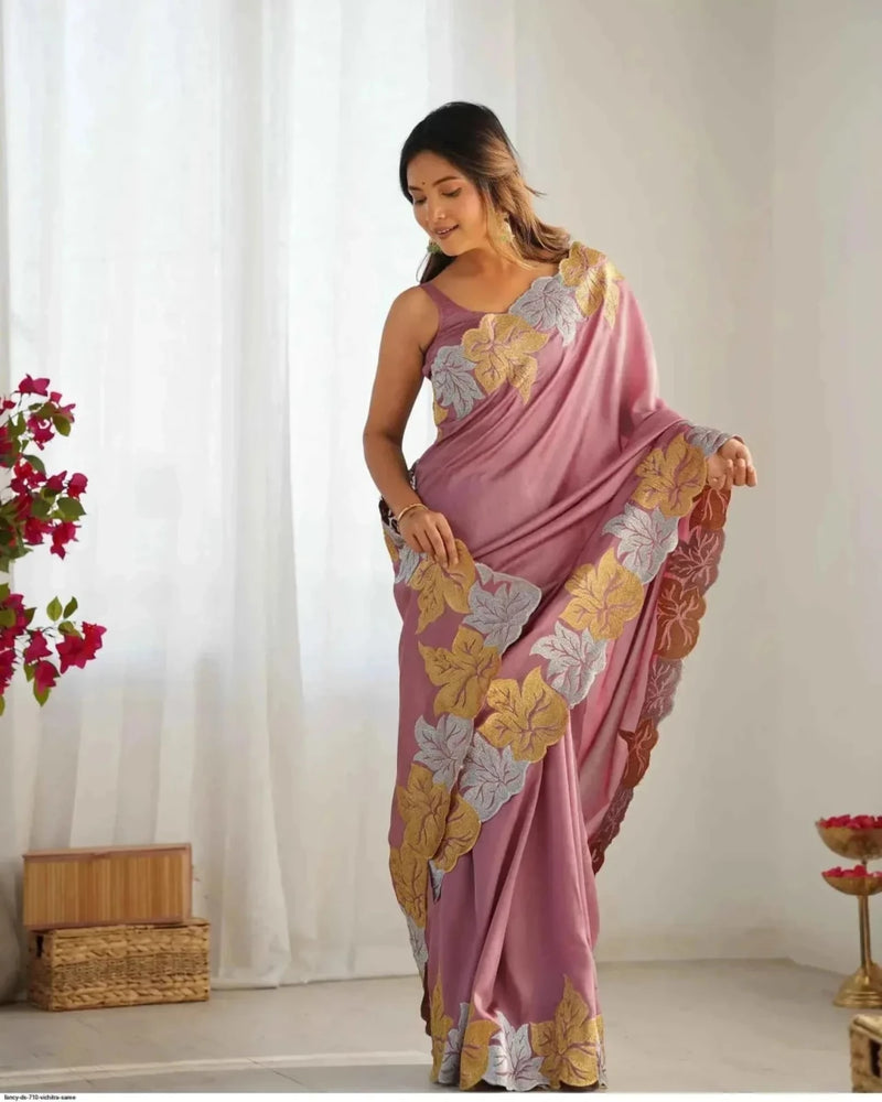 Rose pink saree with large floral embroidery on pallu and border
