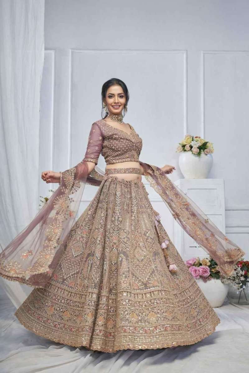 Mauve and gold flared lehenga with embellished blouse and sheer matching dupatta drape