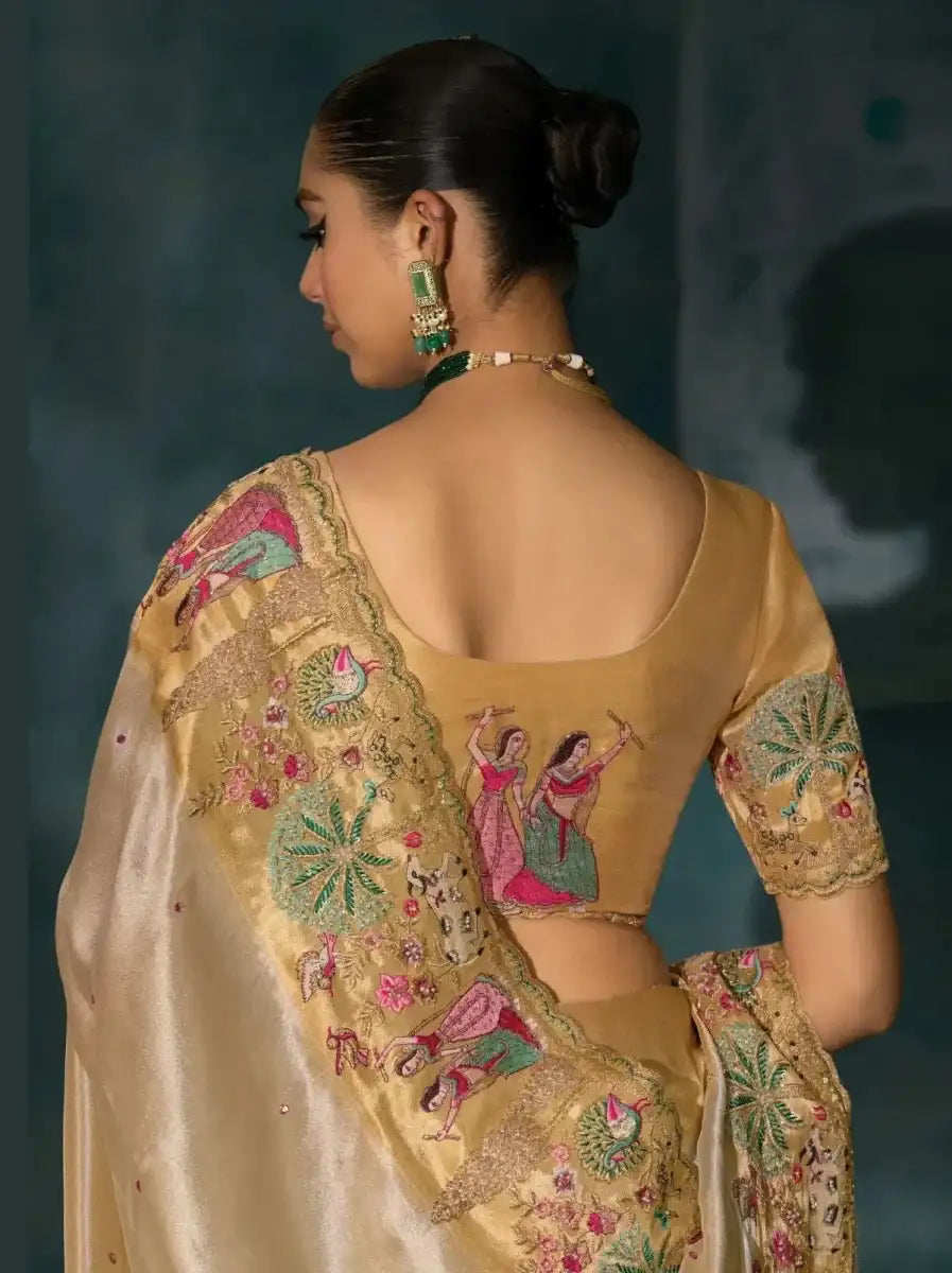 Golden cream Banarasi heritage saree back with embroidered blouse area and motifs