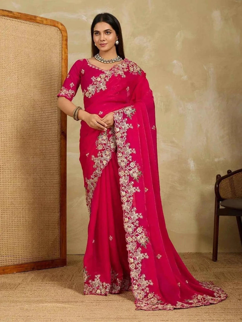 Pink chiffon saree with bold floral cutwork border and embroidered body