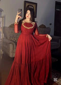 Ruby red designer flare gown with gold embroidered neckline, long sleeves, full skirt