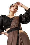 Ruffle saree with black sequined blouse and taupe draped skirt, pleated pallu