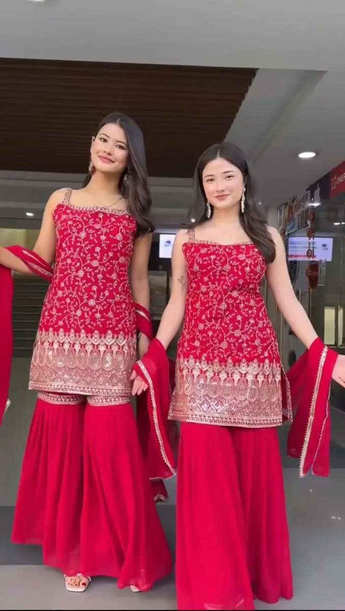 Red sequin-embroidered sleeveless kurta with matching sharara pants and dupatta