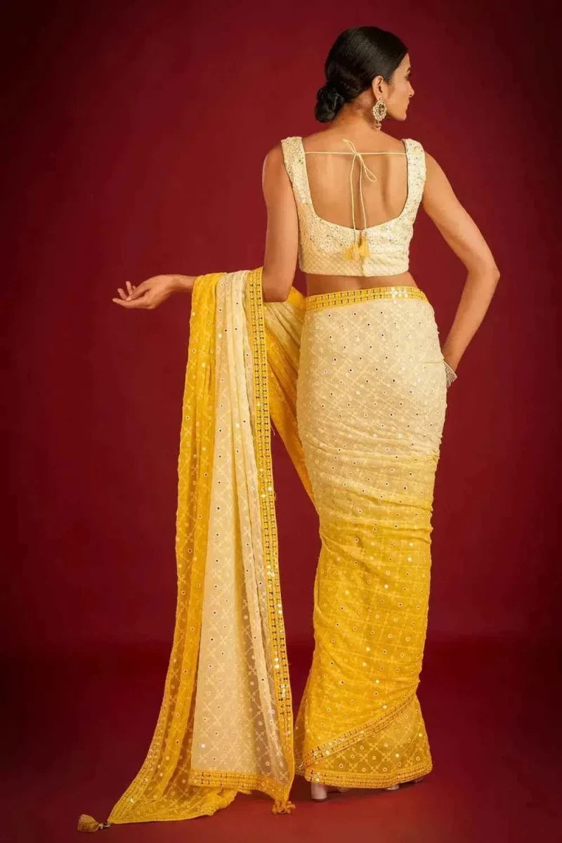 Yellow and cream sequin embroidered saree, back view with sleeveless blouse