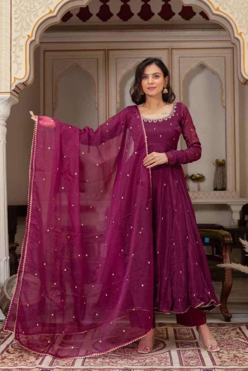 Wine anarkali suit with draped dupatta, sparkle details, long sleeves, and full skirt