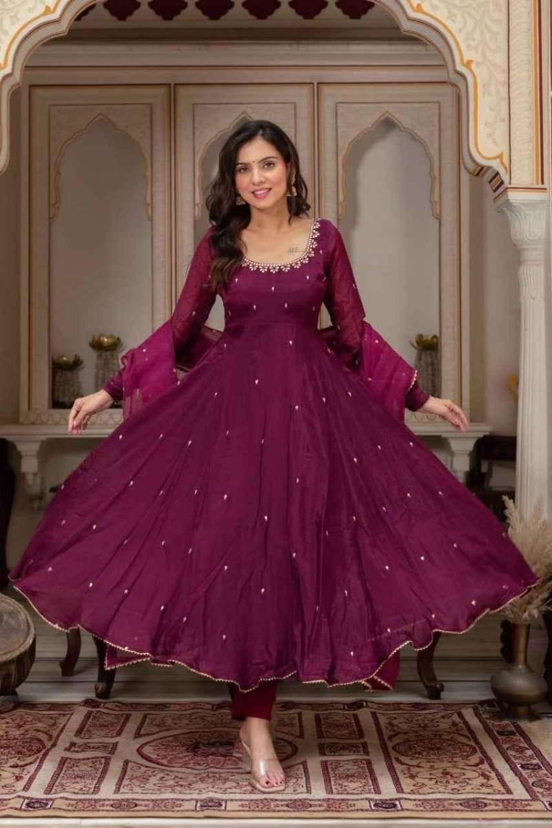 Wine anarkali dress with sparkling allover dots, round yoke, and flared skirt