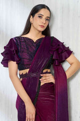 Wine satin silk ready-to-wear saree with textured bodice, ruffled sleeves, and waist drape