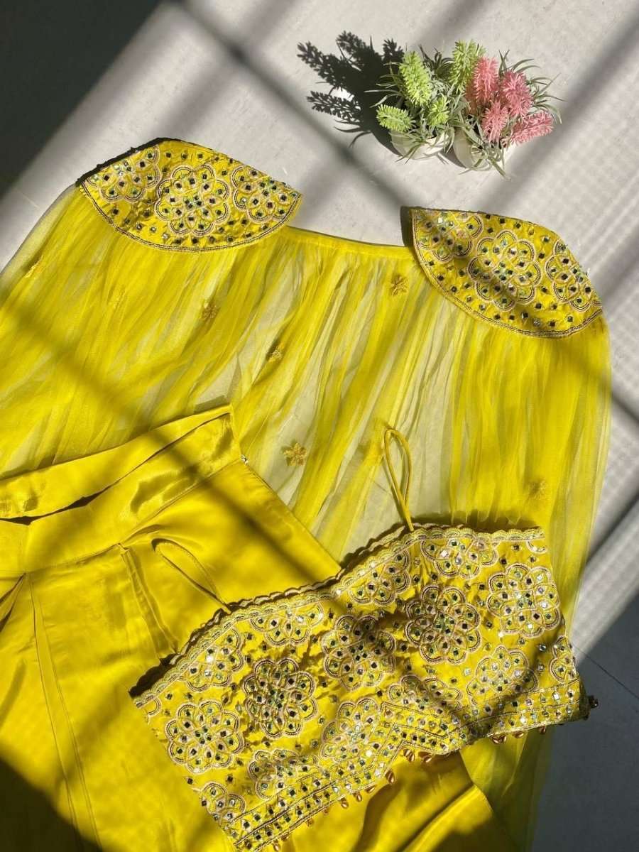 Yellow sequined blouse top, sheer dupatta and dhoti pants set, laid out